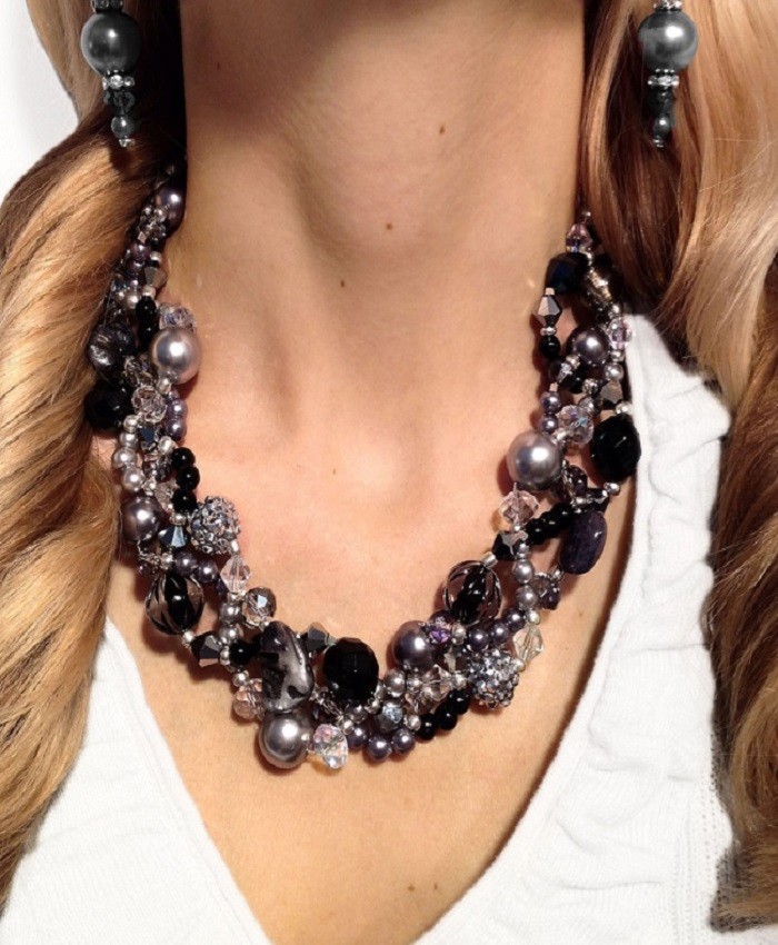 black dress with pearl jewelry