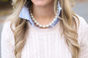 young lady wearing pearls